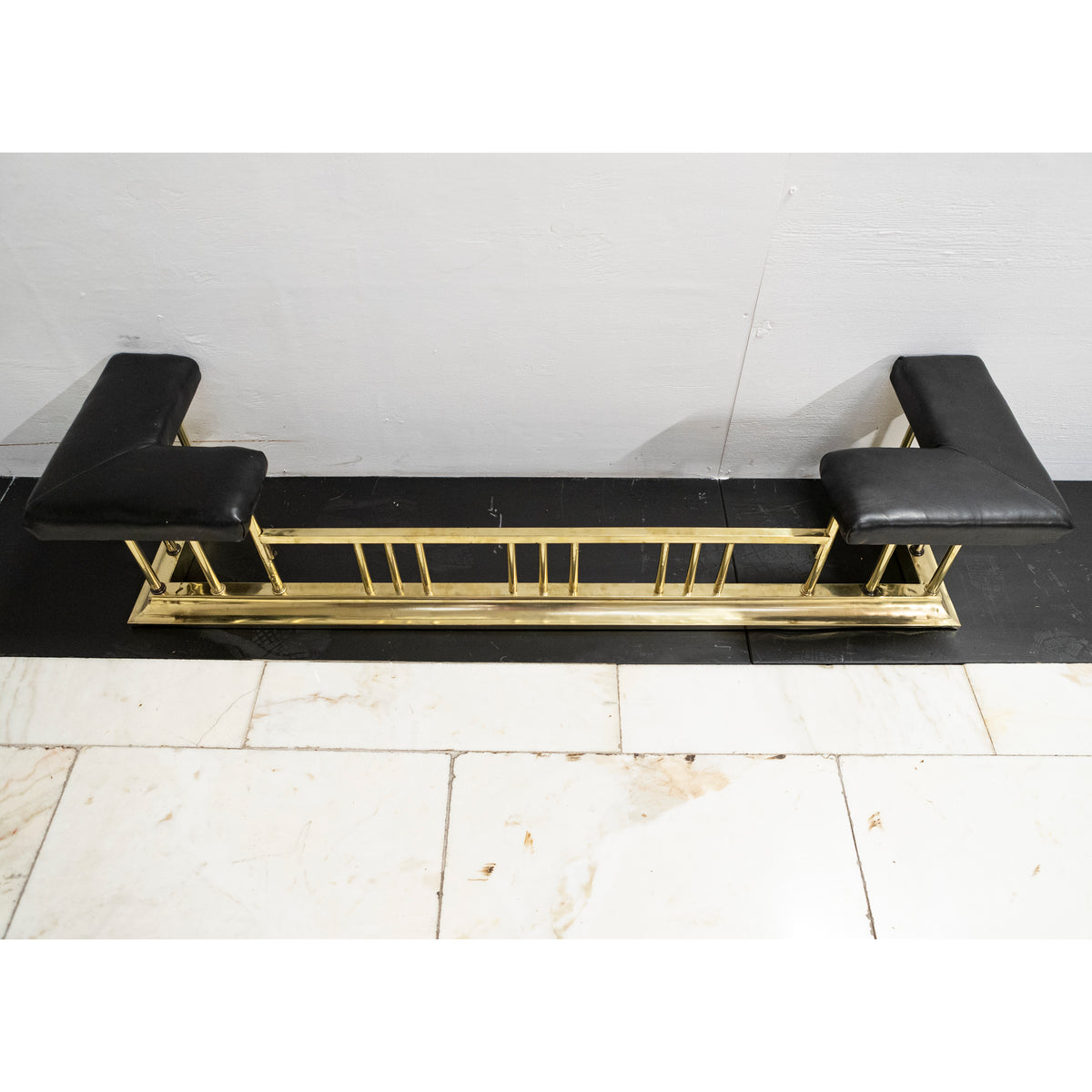 Antique Victorian Brass Club Fender with Black Leather | The Architectural Forum