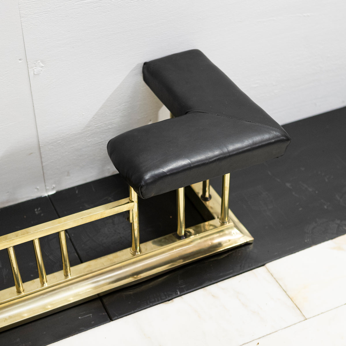 Antique Victorian Brass Club Fender with Black Leather | The Architectural Forum