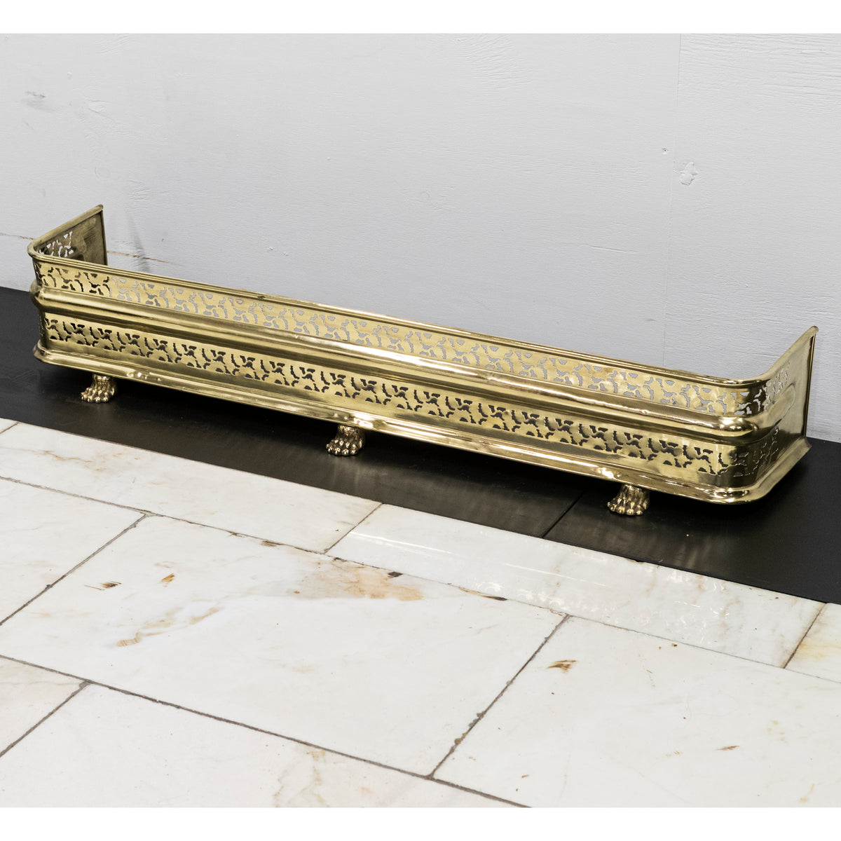 Early 19th Century Antique Brass Fireplace Fender with Lion&#39;s Paw Feet | The Architectural Forum