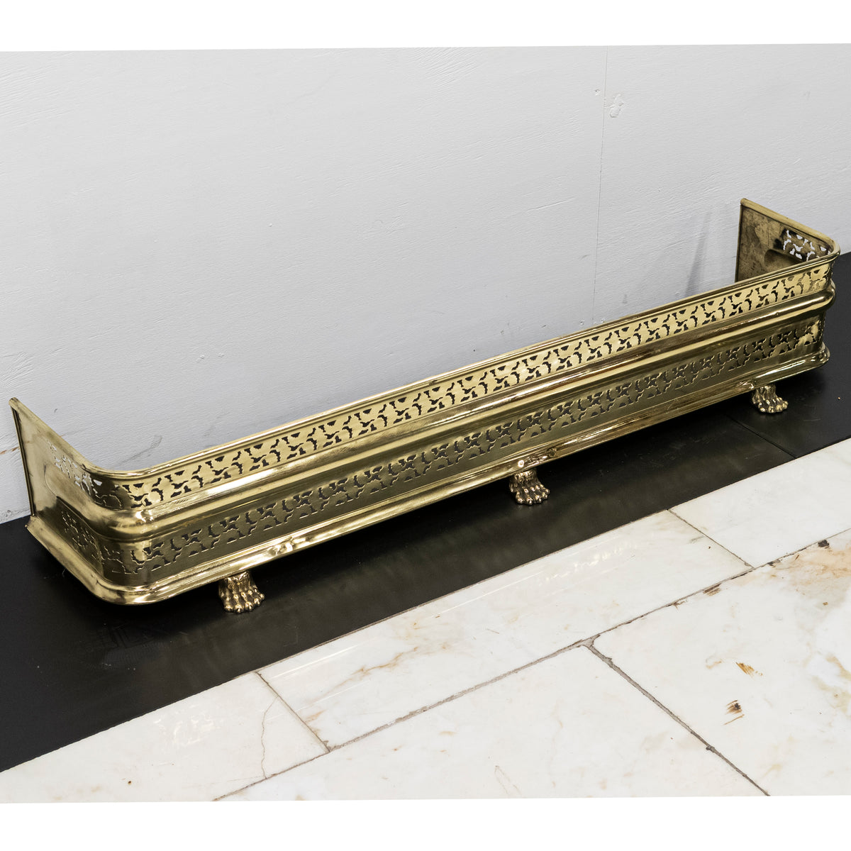 Early 19th Century Antique Brass Fireplace Fender with Lion&#39;s Paw Feet | The Architectural Forum