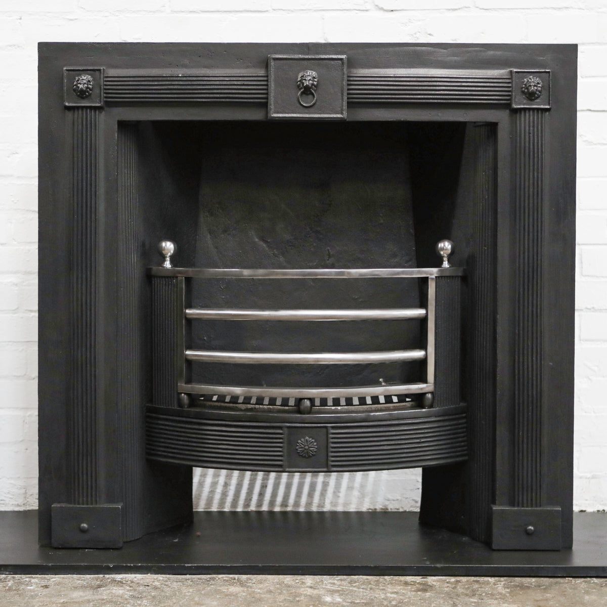 Antique Cast Iron Fireplace Insert with Polished Bars | The Architectural Forum