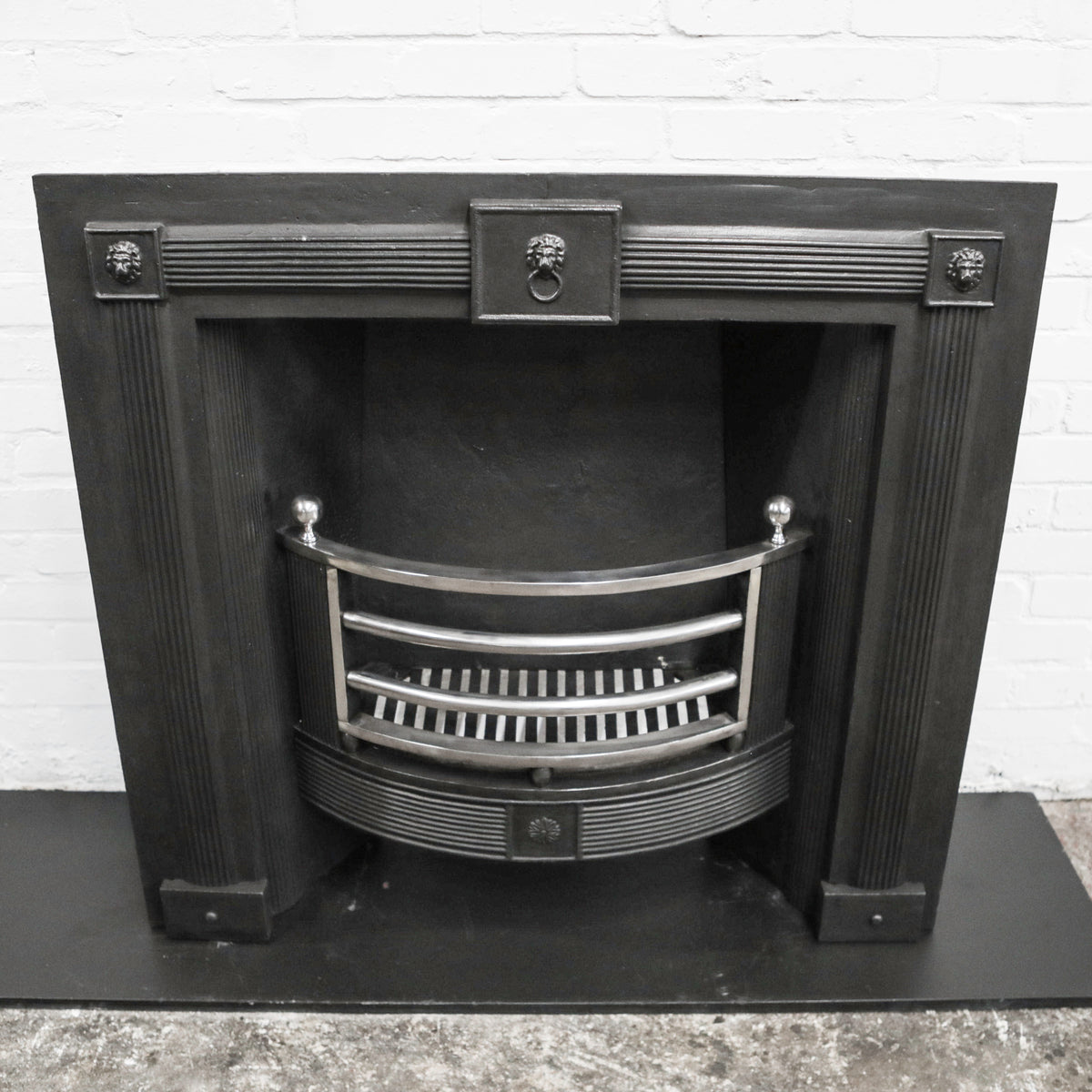 Antique Cast Iron Fireplace Insert with Polished Bars | The Architectural Forum