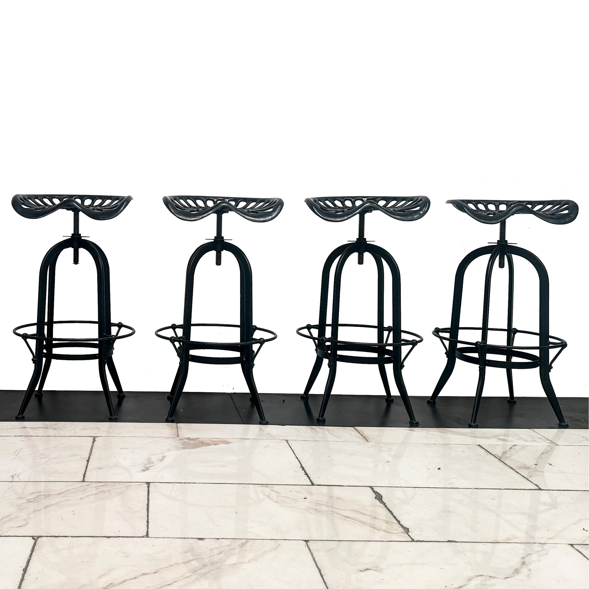 Reclaimed Cast Iron Tractor Seat Adjustable Stools (11 available) | The Architectural Forum