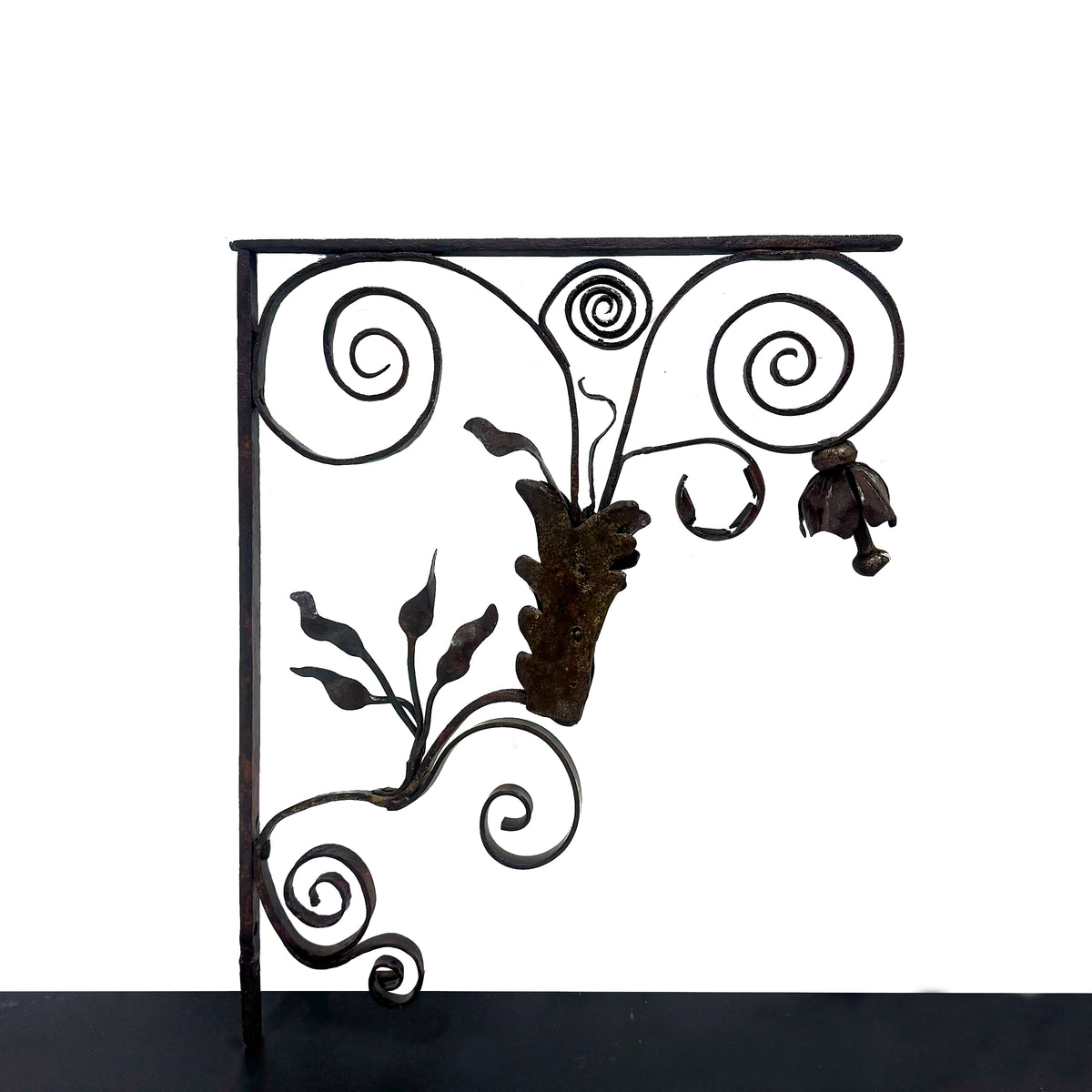 Pair of Antique Wrought Iron Swirling Floral Brackets | The Architectural Forum